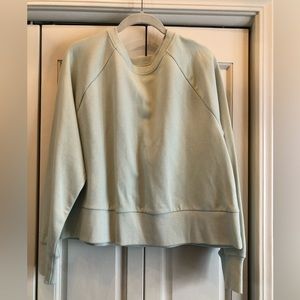 All in Motion mint green French Terry slightly cropped sweatshirt.